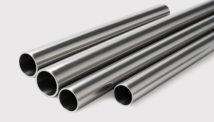 Close-up of seamless stainless steel pipes and tubes by Sun Mark Stainless, ideal for high-performance industrial use.